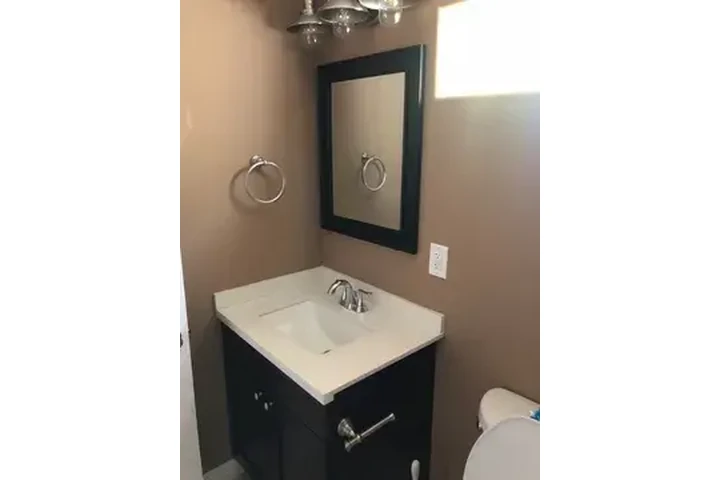 $1000 : This home boasts two spacious image 1