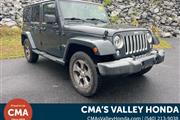 PRE-OWNED 2016 JEEP WRANGLER en Madison WV