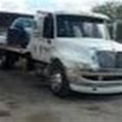 TOWING SERVICIO 24H 3058983678 image 2