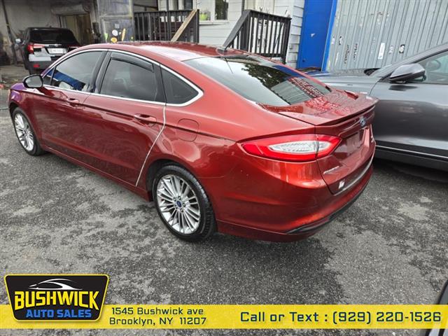 $6995 : Used 2014 Fusion 4dr Sdn SE F image 4