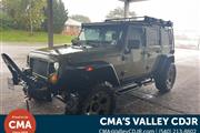 PRE-OWNED 2013 JEEP WRANGLER en Madison WV