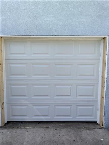 One car roll up garage door image 1