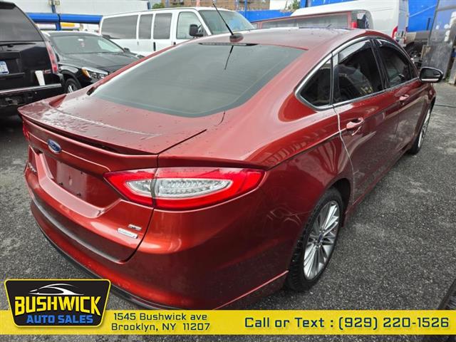 $6995 : Used 2014 Fusion 4dr Sdn SE F image 6