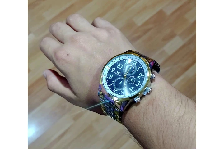 $6000 : Reloj Dorado y Plateado image 3