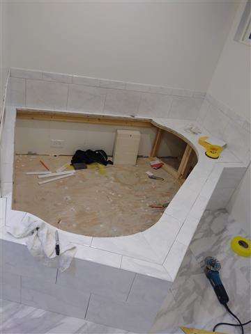Remodelaciones de baños pisos image 2