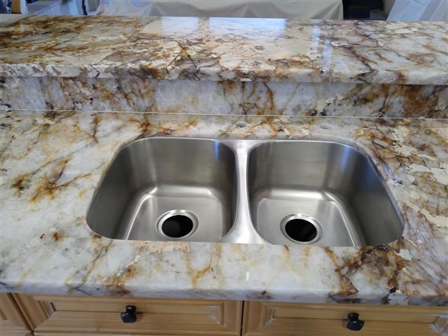A + Solid stone counter tops image 10
