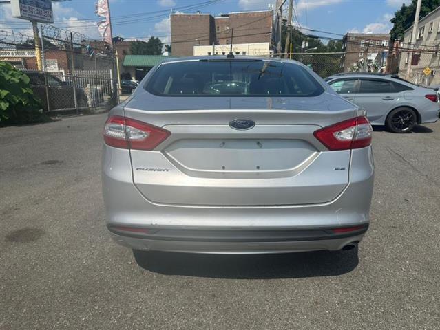 $6999 : Used 2014 Fusion 4dr Sdn SE F image 2