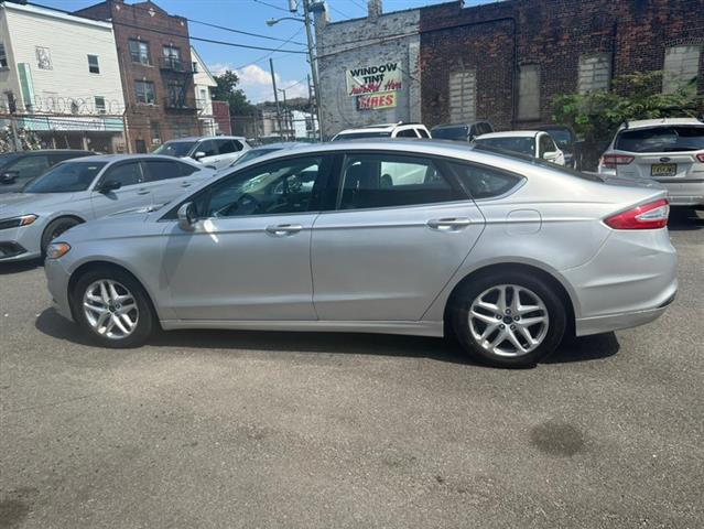 $6999 : Used 2014 Fusion 4dr Sdn SE F image 3