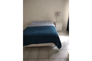 Renta de habitación a Mujer