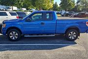 PRE-OWNED 2013 FORD F-150 STX