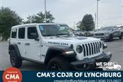 PRE-OWNED 2021 JEEP WRANGLER en Madison WV