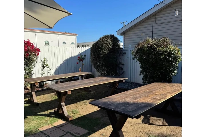 Rustic tables-bounce house image 3