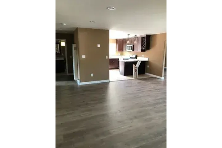 $1000 : This home boasts two spacious image 2