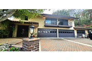 Brown with windows garage door thumbnail