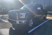 PRE-OWNED 2015 FORD F-150 LAR