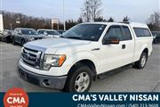 PRE-OWNED 2009 FORD F-150 XLT