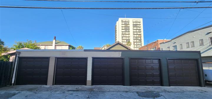 Single brown garage door image 1