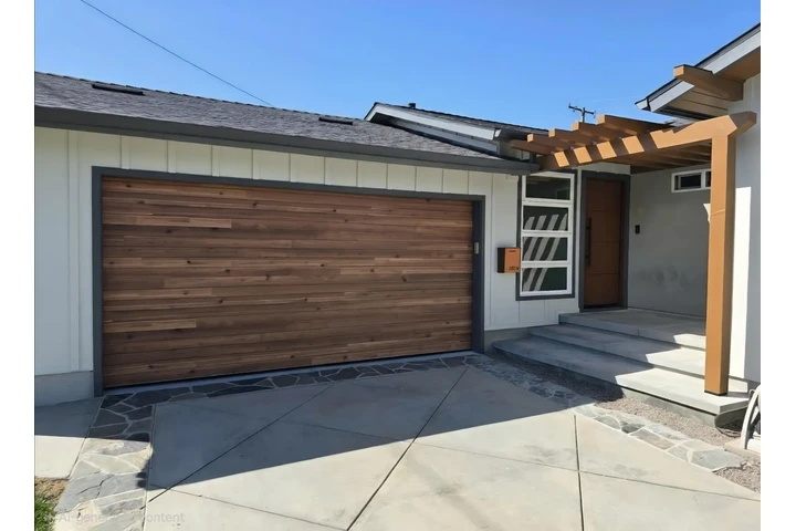 Woodlike plank garage door image 1