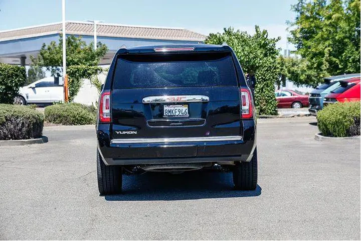 $30033 : GMC Yukon 2019 4x4 Denali 4d image 4