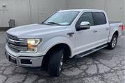 PRE-OWNED 2018 FORD F-150 LAR