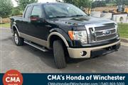 PRE-OWNED 2009 FORD F-150 LAR