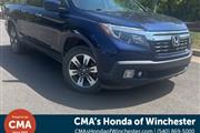 PRE-OWNED 2017 HONDA RIDGELIN en Madison WV