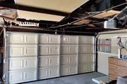 Two cars roll up garage door thumbnail