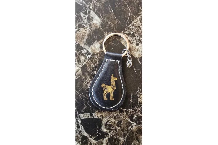 $3 : Llavero de cuero image 1