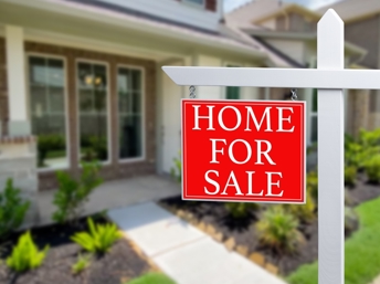 Casa con anuncio de venta