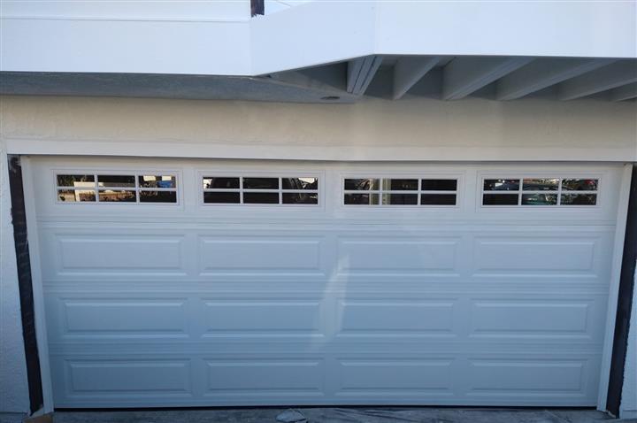Two car garage door w windows image 1