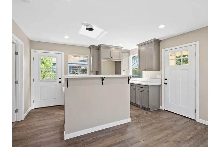 $900 : New Laminate Flooring Through image 2