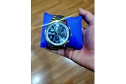 $6000 : Reloj Dorado y Plateado thumbnail
