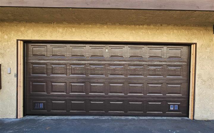 Brown Garage Door with vents image 1