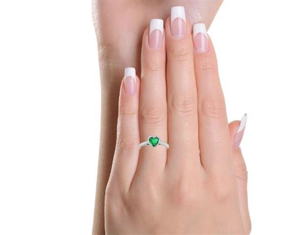$1098 : Emerald Solitaire Ring 0.50cts image 1