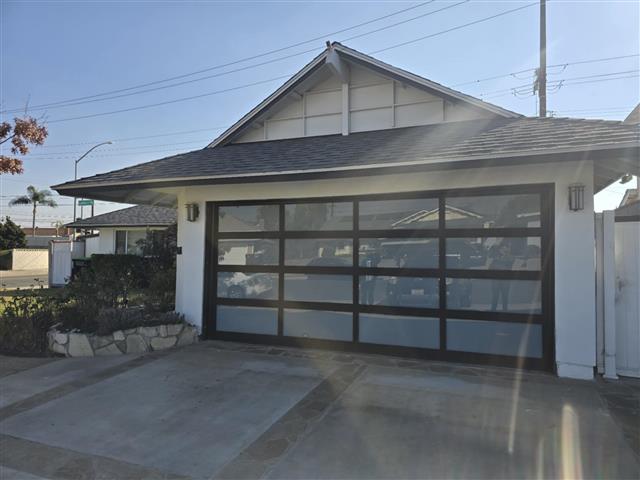 Full glass view garage door image 1