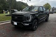 PRE-OWNED 2023 FORD F-150 LAR