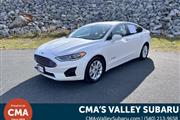 PRE-OWNED  FORD FUSION HYBRID