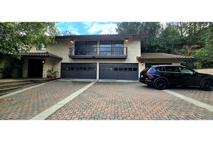 Brown with windows garage door image 1