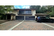 Brown with windows garage door thumbnail