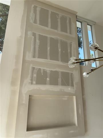 Drywall tapping Chuy image 1