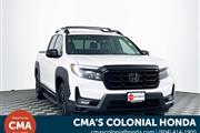 PRE-OWNED 2021 HONDA RIDGELIN