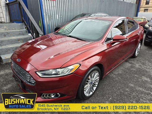 $6995 : Used 2014 Fusion 4dr Sdn SE F image 1