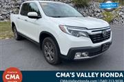 PRE-OWNED 2020 HONDA RIDGELIN