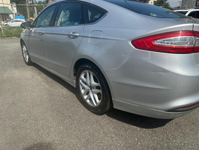 $6999 : Used 2014 Fusion 4dr Sdn SE F image 9