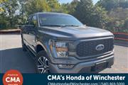 PRE-OWNED 2023 FORD F-150 XL en Madison WV